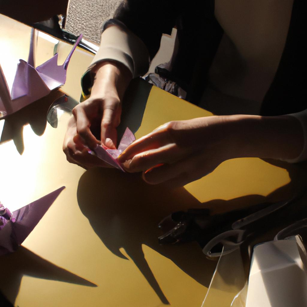 Person folding origami in Japan