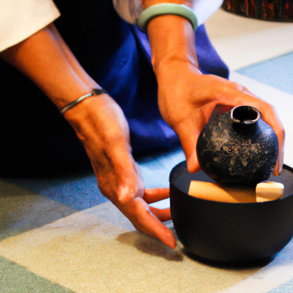 Person performing Japanese tea ceremony